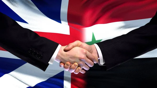 Storbritannien Och Syrien Handslag Internationella Vänskap Flagga Bakgrund — Stockfoto