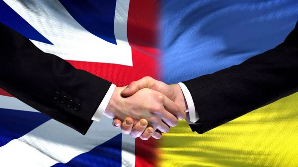 Groot Brittannië Oekraïne Handdruk Internationale Vriendschap Vlag Achtergrond — Stockfoto