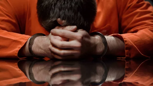 Inmate Holds His Head Desperate Feels Regret Committing Crime Closeup — Stock Photo, Image