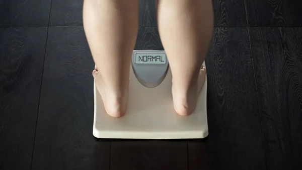 Female Measuring Weight Bathroom Scales Word Normal Screen Rear View — Stock Photo, Image