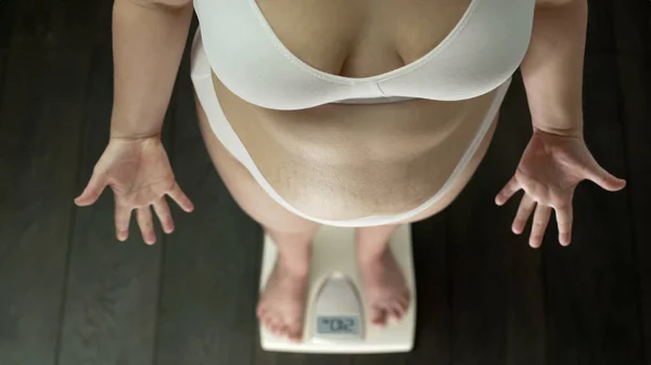 Obese Lady Standing Scales Desperately Gesturing Hands Fat Belly Top — Stock Photo, Image