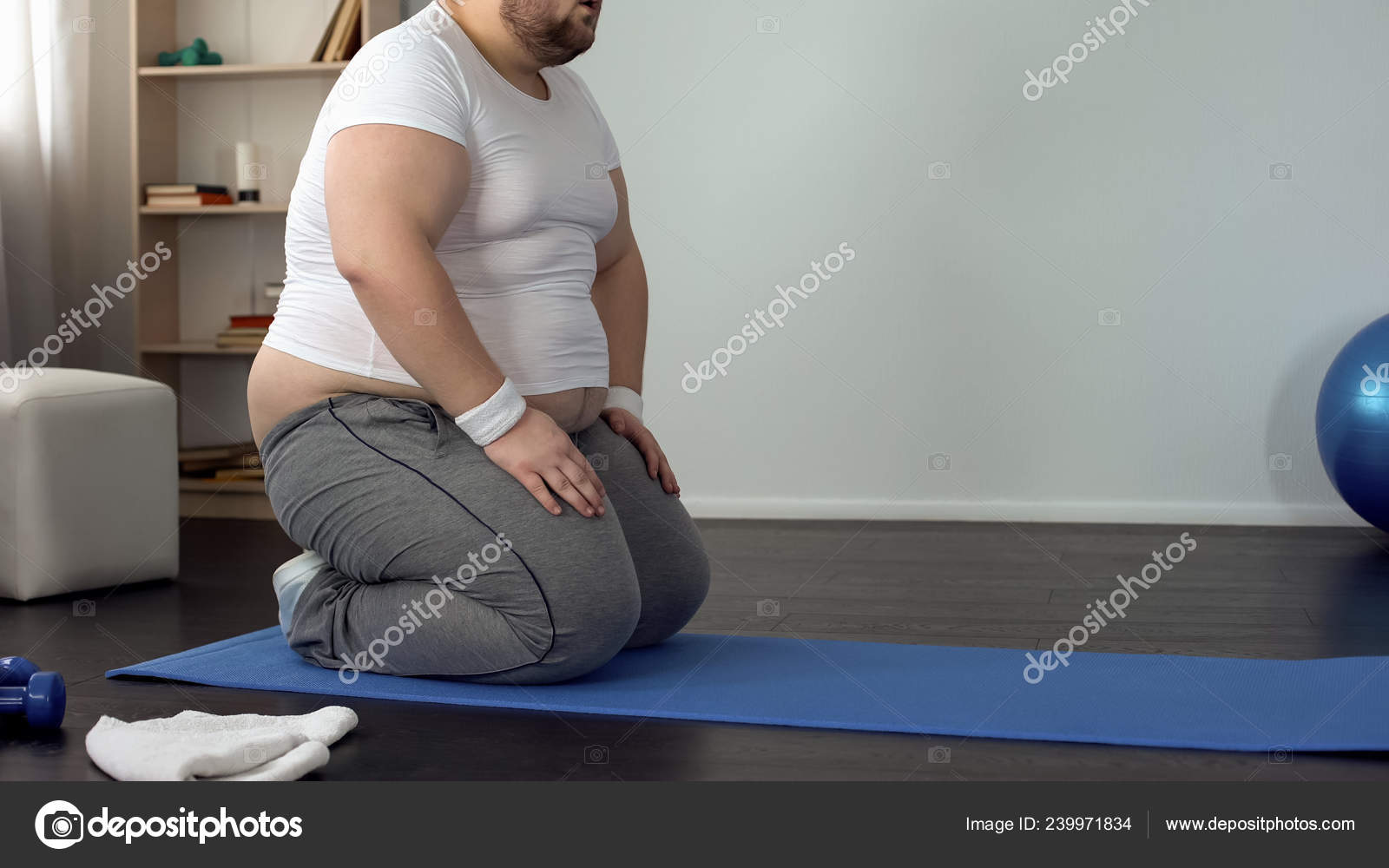 Fat Man Sitting Knees Resting Exhausted Exercises Slimming Process Stock Photo by ©motortion