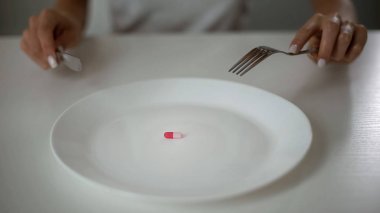 Bayan gıda, Anti-obezite uyuşturucu, şiddetli açlık, sorun yerine hap yeme