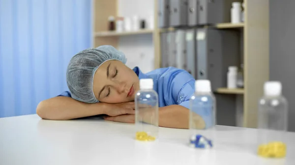 Overworked Nurse Duty Sleeping Table Patients Pills Taking Controlling — Stock Photo, Image