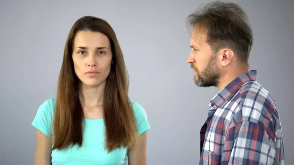 Upset Wife Looking Camera Man Nearby Aid Domestic Violence Victim — Stock Photo, Image