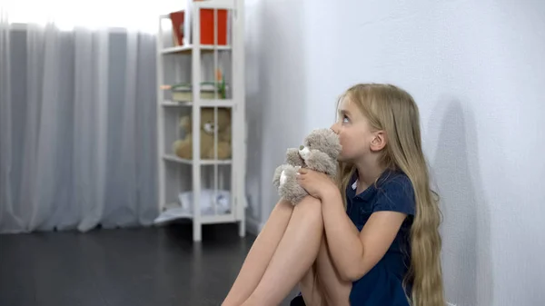 Frightened Girl Toy Friend Sitting Floor Scared Imaginary Monster — Stock Photo, Image