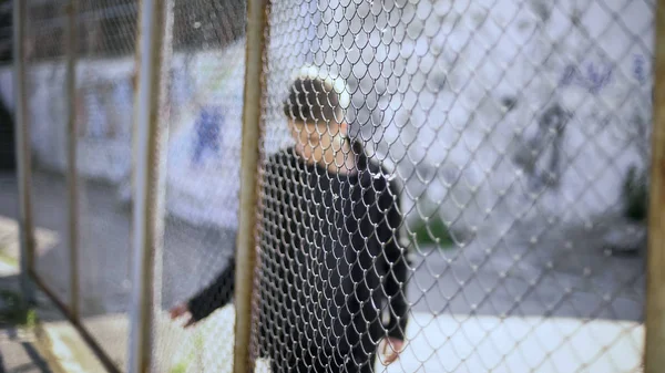 Teen Boy Fence Confinement Boarding School Restrictions Broken Future — Stock Photo, Image