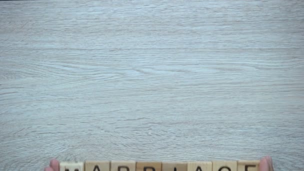 Marriage Hands Pushing Word Wooden Cubes Family Wife Husband Children — Stock Video