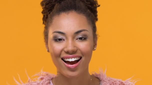 Joyful Afro American Stylist Putting Fashionable Eyeglasses Yellow Background — Stock Video