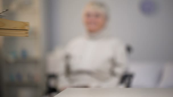 Young Nurse Serving Dinner Old Handicapped Lady Taking Care Patient — Stock Video