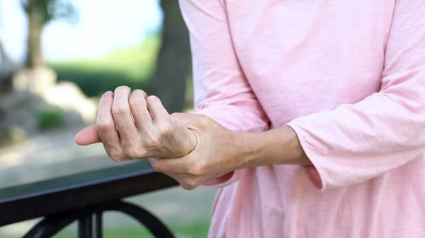 Old Woman Stretching Numb Arm Weakness Muscles Senior Age Arthritis Royalty Free Stock Images