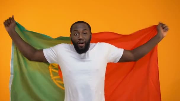 Amazed Afro American Sport Fan Waving Portuguese Flag Cheering Victory — Stock Video