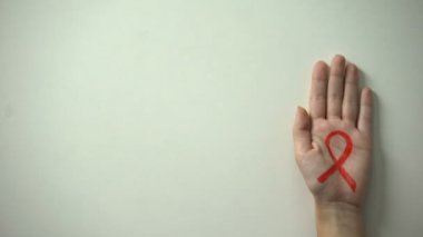 Dur HIV yazıt, el ile kırmızı kurdele, farkındalık ve korunma kampanya