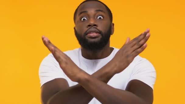 Emotional Afro American Male Crossing Hands Warning Gesture Yellow Background — Stock Video