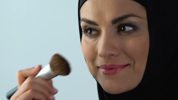 Smiling Muslim Woman Her 30S Applying Face Blush Age Cosmetics — Stock Video