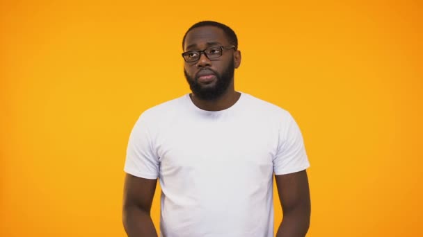 Smart Young Black Student Glasses Thinking Answer Yellow Background — Stock Video