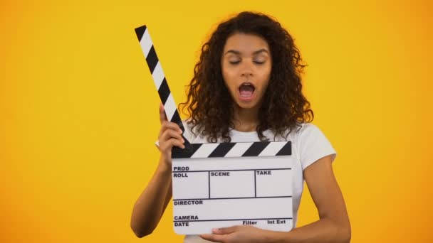 Shocked Producer Assistant Saying Wow Using Clapper Board Shooting Movie — Stock Video