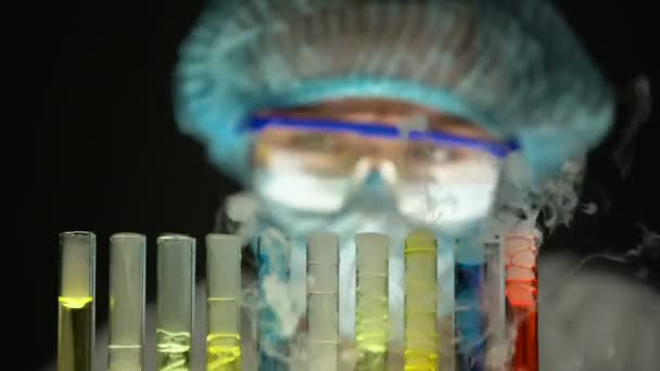 Scientist Observing Reaction Test Tubes Multicolor Liquids Poisons — Stock Video