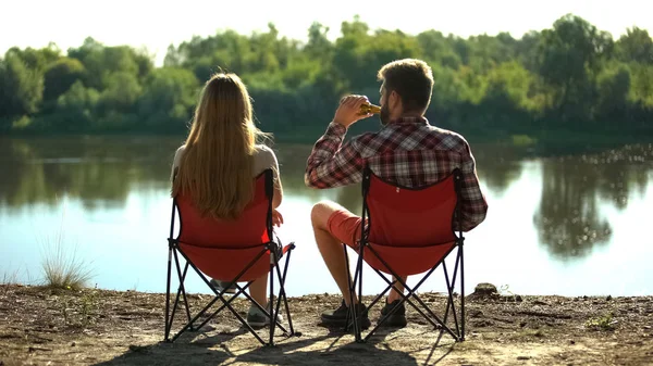 Couple Sitting Enjoying Beautiful River Scape Man Drinking Beer Addiction — Stock Photo, Image