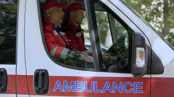 Male Doctors Sitting Ambulance Ready Drive Out Call Professionals — Stock Photo, Image