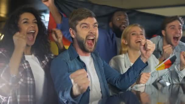 Sport fans waving German flag, celebrating victory of national team, patriotism — Stock Video