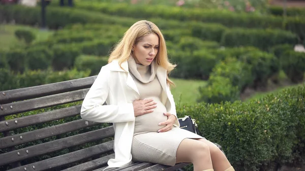 Worried Pregnant Lady Breathing Deeply Sitting Bench Tummy Ache Contractions — Stock Photo, Image
