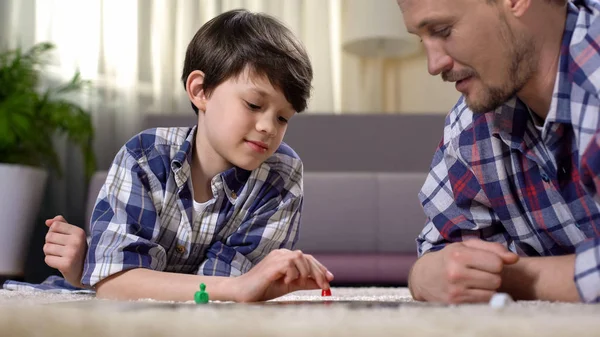 Carefree Father Son Playing Board Game Lying Floor Happy Family — Stock Photo, Image