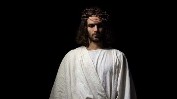 Jesus in crown of thorns and robe giving hand, asking for belief and kindness — Stock Video