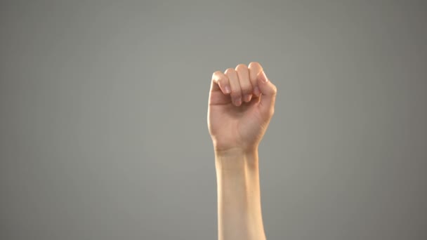 Рука, що показує "так ", текст на фоновому зв'язку для глухих, підручник — стокове відео
