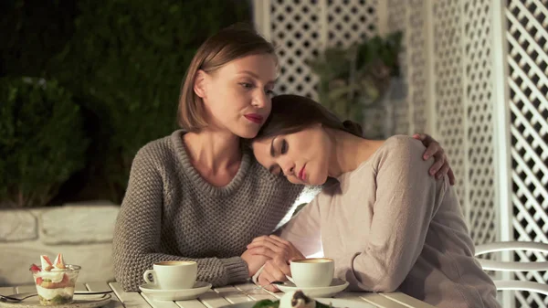 Young Woman Hugging Sad Female Friend Sitting Terrace Friendship — Stock Photo, Image