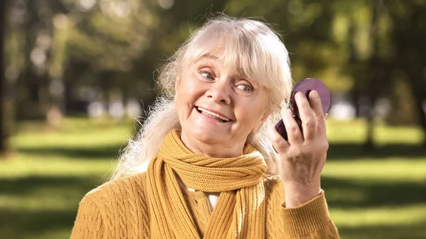 Cheerful Old Woman Sincerely Smiling Looking Her Reflection Compact Mirror — Stock Photo, Image