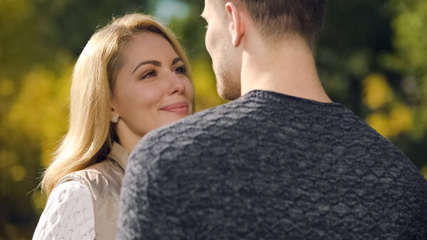 Smiling woman looking at beloved man, dating agency website, togetherness