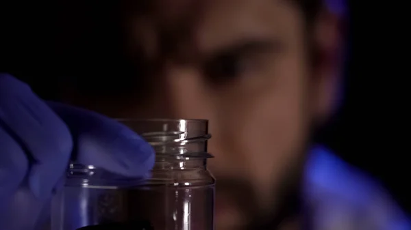 Forensic Scientist Holding Glass Jar Hands Examining Crime Scene Evidence — Stock Photo, Image