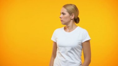 Worried woman looking around, panic attack, fear expression, stress reaction