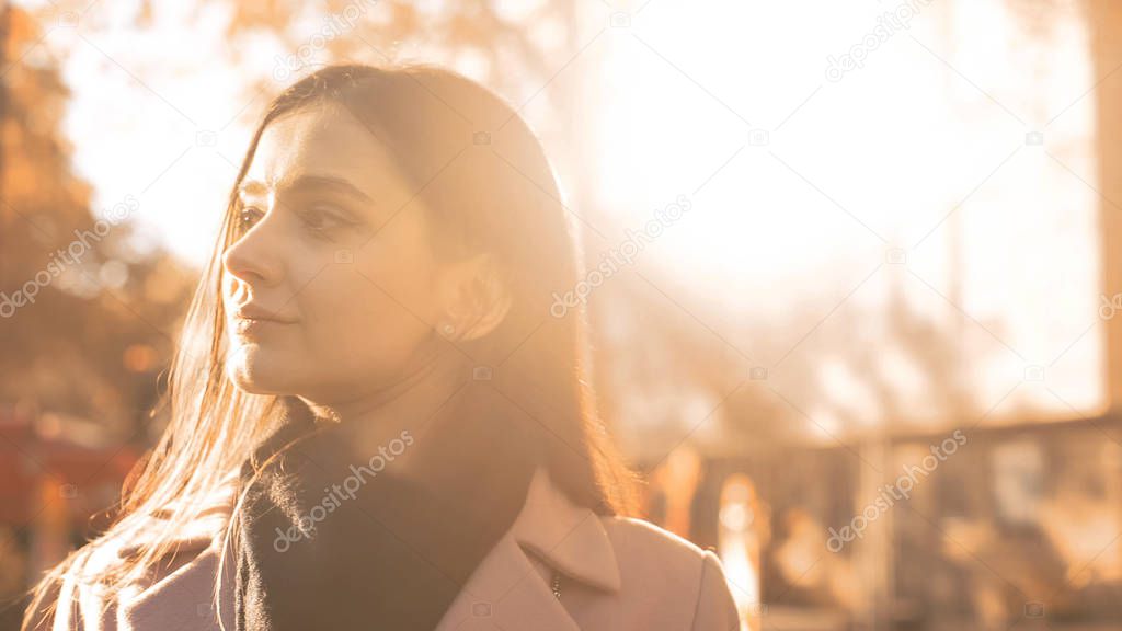 Pensive woman walking in beautiful autumn park, recreational day promenade