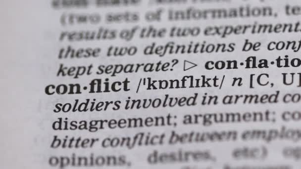 Conflict word in english dictionary, disagreement in negotiations and interests — Stock Video