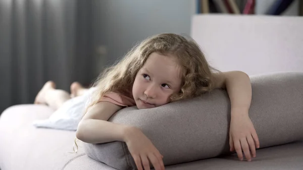 Carefree Girl Lying Coach Dreaming New Toys Happy Childhood — Stock Photo, Image