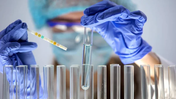 Lab Worker Holding Blue Liquid Tube Measuring Acidity Level Scientific — Stock Photo, Image
