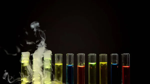 Laboratory Tubes Color Liquids Emitting Smoke Black Background — Stock Photo, Image