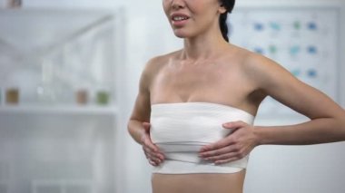 Elasto-fit meme kompresyonu dokunmadan Wrap kadın, ameliyattan sonra ağrı hissi