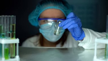 Scientist taking bottle with liquid from fridge, antibiotic development, toxin clipart