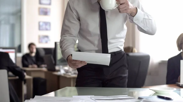 Male Ceo Looking Documentation Drinking Tea Standing His Office — Stock Photo, Image