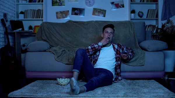 Teenager Eating Popcorn Switching Channels Wasting Time Boredom — Stock Photo, Image