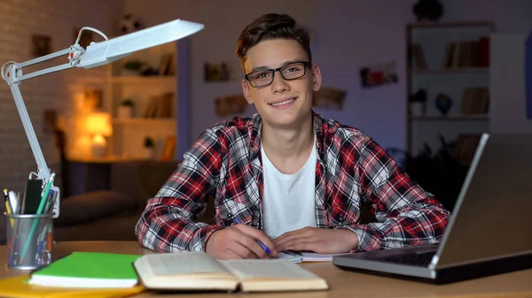 Diligent Teen Student Glasses Finishes Homework Looks Directly Camera — Stock Photo, Image