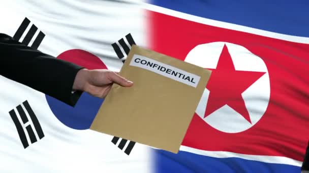 Corée du Sud et Corée du Nord échange d'enveloppes confidentielles, de drapeaux 