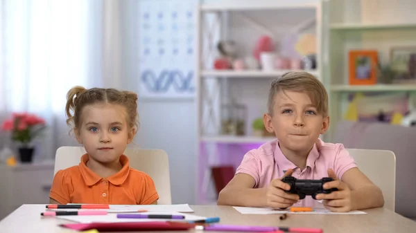 Boy Playing Video Game Using Console Sister Looking Screen Having — Stock Photo, Image