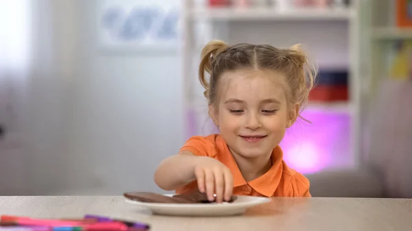 Female Kid Secretly Taking Chocolate White Plate Table Sugar Overdose — Stock Photo, Image