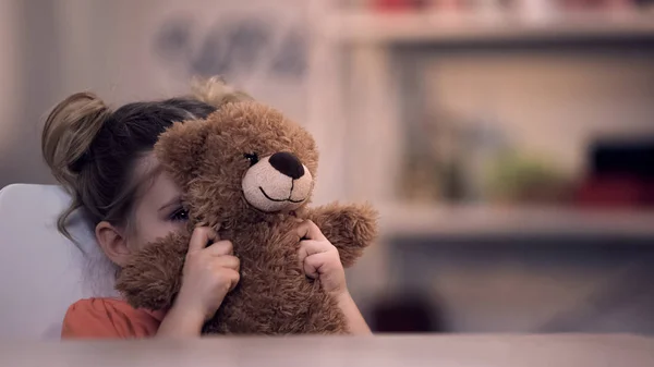 Sad Female Kid Covering Face Teddy Bear Toy Family Problem — Stock Photo, Image