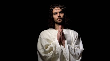 İsa 'nın taç içinde ağlıyor ve masum ruhlar için dua, ceza