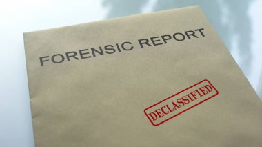 Forensic report declassified, seal stamped on folder with important documents clipart